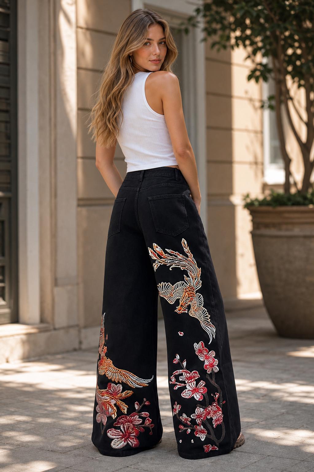Black wide-leg jeans with phoenix and floral embroidery